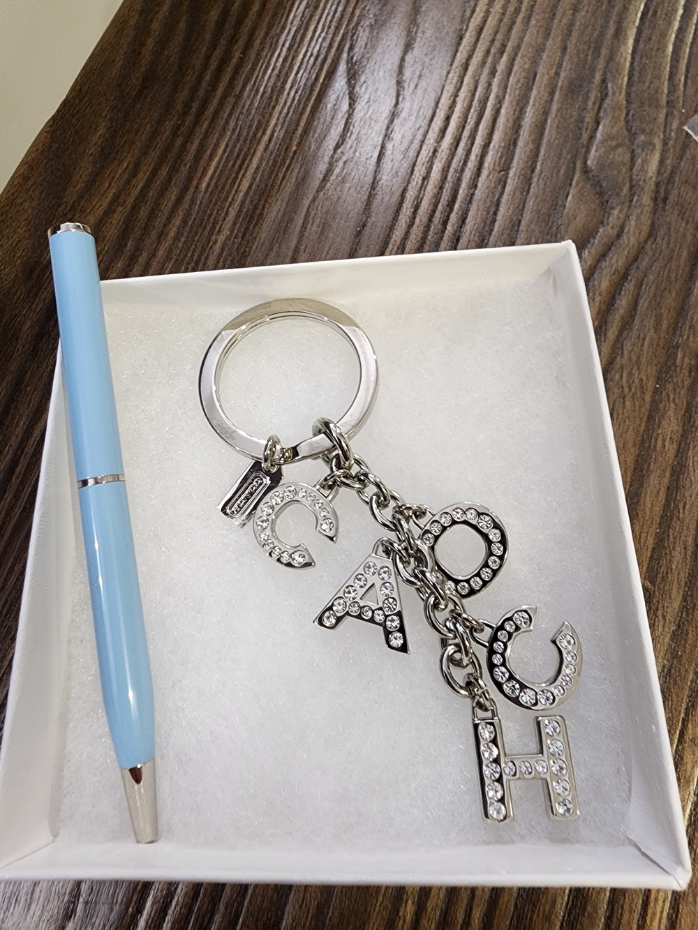 Coach Silver Crystal Letter Charm Keychain With Matching Coach Pen.